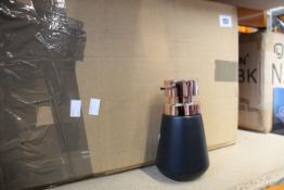 Twenty seven Sealskin Conical soap dispensers and a Sealskin Rigato shower curtain, all as new.