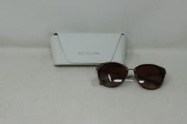 A pair of as new Michael Kors ABELA lll MK6040 sunglasses.