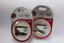 Three as new G7th Performance 3 Guitar Capos for steel strings (Special Edition Celtic Engraved).