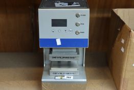 A pre-owned Devil Press RPE3 heat press machine.