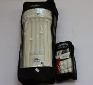 An as new pair of Newberry Axe batting gloves and a as new pair of Newbery Axe batting leg guards.