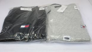 An as new tommy Sport 1/2 zip fleece mid layer (M) an a pair of tommy Sports cuffed regular fleece
