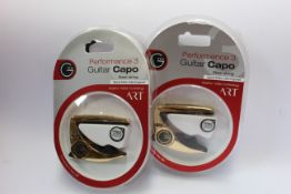 Three as new G7th Performance 3 Guitar Capos for steel strings (Special Edition Celtic Engraved).