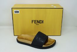A pair of as new Fendi Layered Logo slides (UK 6).