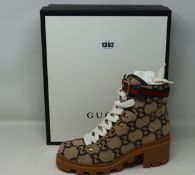 A pair of as new Gucci GG wool ankle boot (EU 40 - RRP £700).