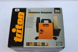 A boxed as new Triton TWS S10 whetstone sharpener (120W).
