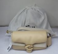 An as new Coach W Pillow Tabby shoulder bag 26 in ivory (RRP £495).
