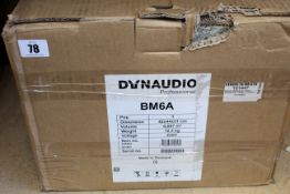 A boxed Dynaudio BM6A studio monitor in black (Single).