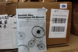 A boxed as new electric bike conversion kit.