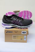 A pair of women's as new Asics GT-2000 9 G-TX trainers (UK 6).