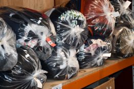 Ten bags of clothing and related items.