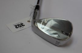 An as new Titleist Vokey Design SM8 wedge 52/08F (Right handed).