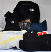 An as new The North Face Vault backpack (RRP £60), The North Face Exploration trousers (34 - RRP £