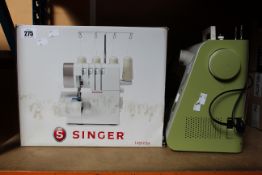 A boxed pre-owned Singer 2/3/4 thread overlook (Box damaged) together with a pre-owned Alfa green