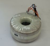 A Block 2000/2x115 toroidal transformer.