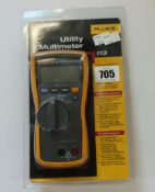 A Fluke 113 true RMS multimeter.