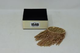 A Rosantica crystal tasselled bangle (Possibly pre-owned but in as as new condition).