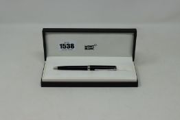 A boxed as new Montblanc PIX Trademark black precious resin AKA M25857 ballpoint pen (Initialled