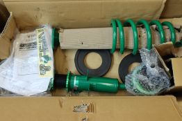 A boxed as new Tein Flex Z coilover kit (PN: VSP24-C1AS3, Model: Z33/H33/PV35/CPV35).