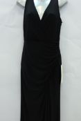 An as new Adrianna Papell Jersey Halter beaded back dress in black (Size 8).