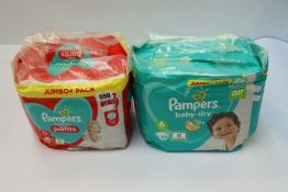 Six packs of Pampers Size 6 Baby-Dry nappies 13-18kg (62s) and four packs of Pampers Baby-Dry Size 5