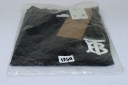 An as new Burberry Atherton long sleeved monogramed top in black (XXS - RRP £370).