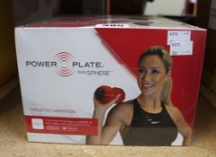 Three boxed as new Power Plate dual sphere vibration rollers in red.