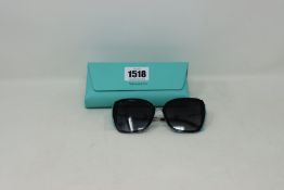 A pair of lady's boxed as new Tiffany & Co. sunglasses (0TF4160 82853C 54).