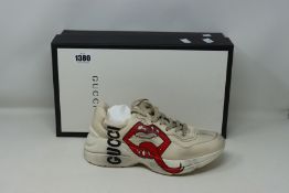 A pair of women's as new Gucci Rhyton sneaker with mouth print (EU 38+ - RRP £705).