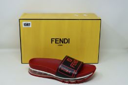 A pair of as new Fendi Signature Logo Fussbett slides (UK 9).