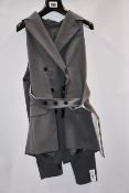 An as new Rokh Pour Femme Pret a Porter removable sleeves blazer in grey (Size 36 - RRP £805).