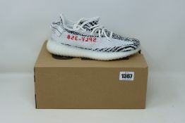 A pair of as new Adidas Yeezy Boost 350 V2 (UK 5).