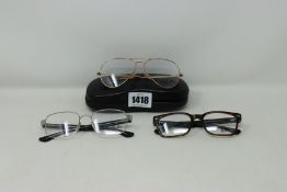 Three pairs of as new Ray Ban glasses frames.