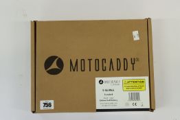 A boxed as new Motocaddy S-series standard 14.4v 16Ah lithium golf battery with charger.