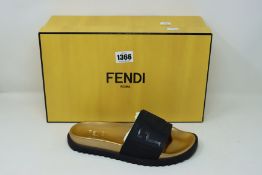 A pair of as new Fendi Layered Logo slides (UK 4).