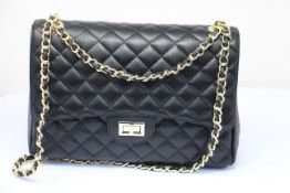 Six assorted as new Mela D'Oro handbags.