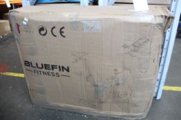 A boxed Bluefin Fitness Tour SP exercise bike.