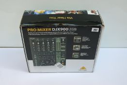 A boxed as new Behringer DJX900 Pro USB DJ Mixer.