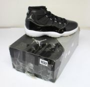 A pair of as new Nike Air Jordan 11 Retro (UK 7.5).