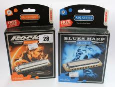 5 boxed as new Hohner harmonicas to include; Three a new rocket progressive harmonicas and two boxed