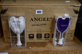 Fifty boxed as new Tangel Angel 2.0 Detailing Brushes in white.