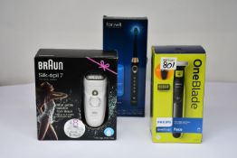 A Braun wet and dry Silk Epil 7 for legs/body/face, a Phillips one blade trim edge and shave any