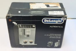 A boxed as new DeLonghi Autentica coffee machine with traditional milk frother (8004399328662).
