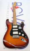 An as new Fender Stratocaster HSH Pau Ferro/Tobacco (0144533552).