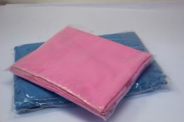 A quantity of as new blue and pink ponchos.