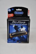 Five boxed as new Hohner MS-Series Pro Harp harmonicas (Two in F#, one in D, one in A and one in