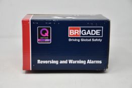 A boxed as new Brigade SA-BBS-107 A1400 White Sound Reversing Alarm (12-24Vdc - 87-107dB(A).