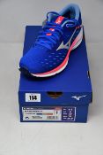 A pair of women's as new Mizuno Wave Rider 24 trainers (UK 6).