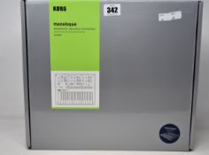 A boxed as new monologue monophonic analogue synthesizer in Dark Blue.