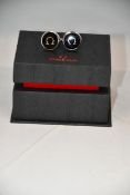 A pair of as new Omega cufflinks (RRP £220).